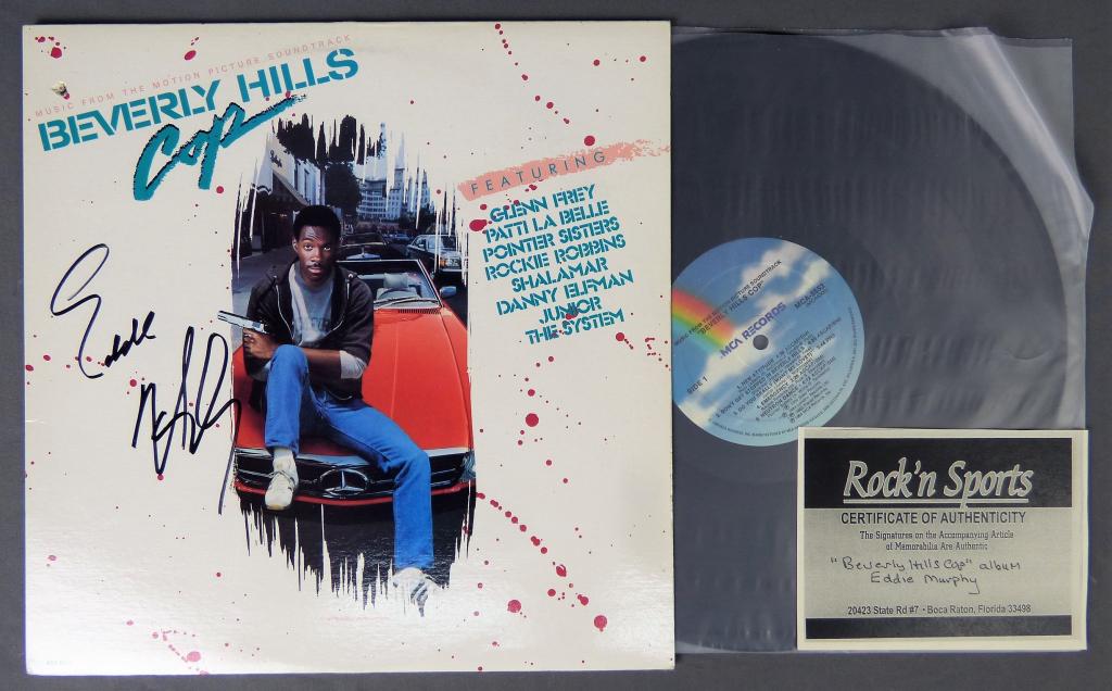Eddie Murphy Signed "Beverly Hills Cop" Album: Eddie Murphy Signed/ Autographed "Beverly Hills Cop" Full Size Album Cover with Album. Comes with Certificate of Authenticity. Condition: Good. We truly believe that this item is authentic, but Esquis