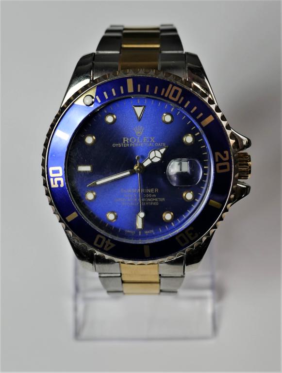 Rolex Oyster Submariner Wrist Watch Replica: Replica of Rolex Oyster Perpertual Date Submariner Wrist Watch. Good Working Condition.