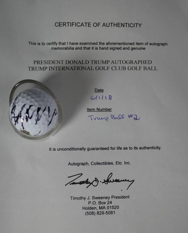 President Donald Trump Signed Golf Ball: President Donald Trump Autographed/ Signed Trump International Golf Club Golf Ball. Comes with Certificate of Authenticity. Condition: Good. We truly believe that this item is authentic, but Esquis Au
