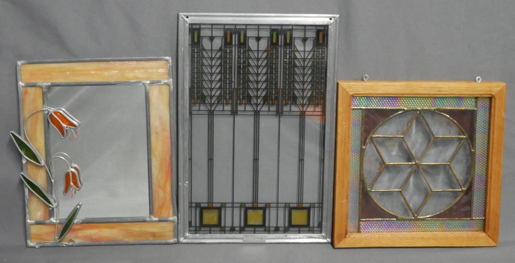 Frank Lloyd Wright MMA Stained Glass Panel & Other: Frank Lloyd Wright Stained Glass Panel released by MMA; Stained Slag Glass Wall Mirror and Stained Glass Wall/ Window Decor. Measure 12 1/2" x 8 1/2", 9" x 9" and 8" x 10". All are in good condition.