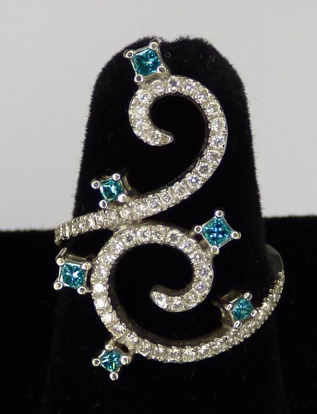 18k Gold Ring w/ Diamonds & Blue Topaz Gemstones: Elegant Ladies 18k White Gold Ring with Diamonds and 6 Topaz Stones. Size- 6 3/4. Good Condition.