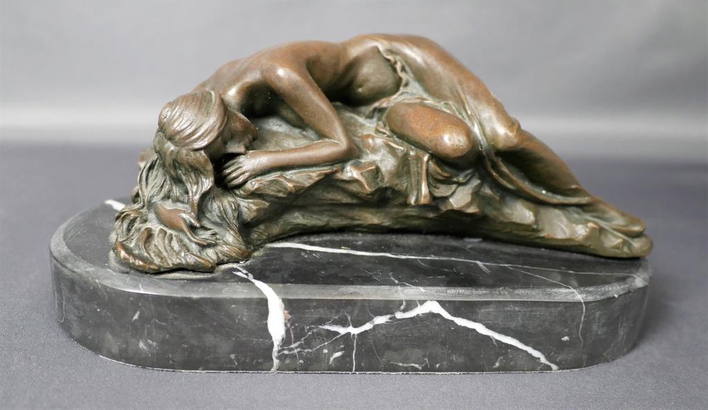 Max Milo Bronze Nude Sculpture: Max Milo (1938- ). Bronze Nude Sculpture. Signed on side with "European Bronze Finery" medal. Marble Base. Measures 4 1/2" x 9" x 4". Good Condition.