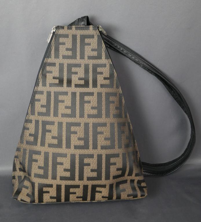 Fendi Designer Ladies Backpack/ Handbag: Fendi Designer Ladies Backpack/ Handbag. Good Condition. Esquis Auction does not have specialists on designer purses and handbags and we can not guarantee authenticity of these items. Please, review a