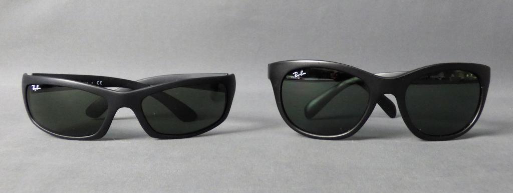 Ray Ban Designer Sunglasses- His & Hers: Two Pairs of Ray Ban Sunglasses. His- Rb 4026 and Hers- Rb 4216. Ladies Sunglasses have some minor scuffs on lenses.