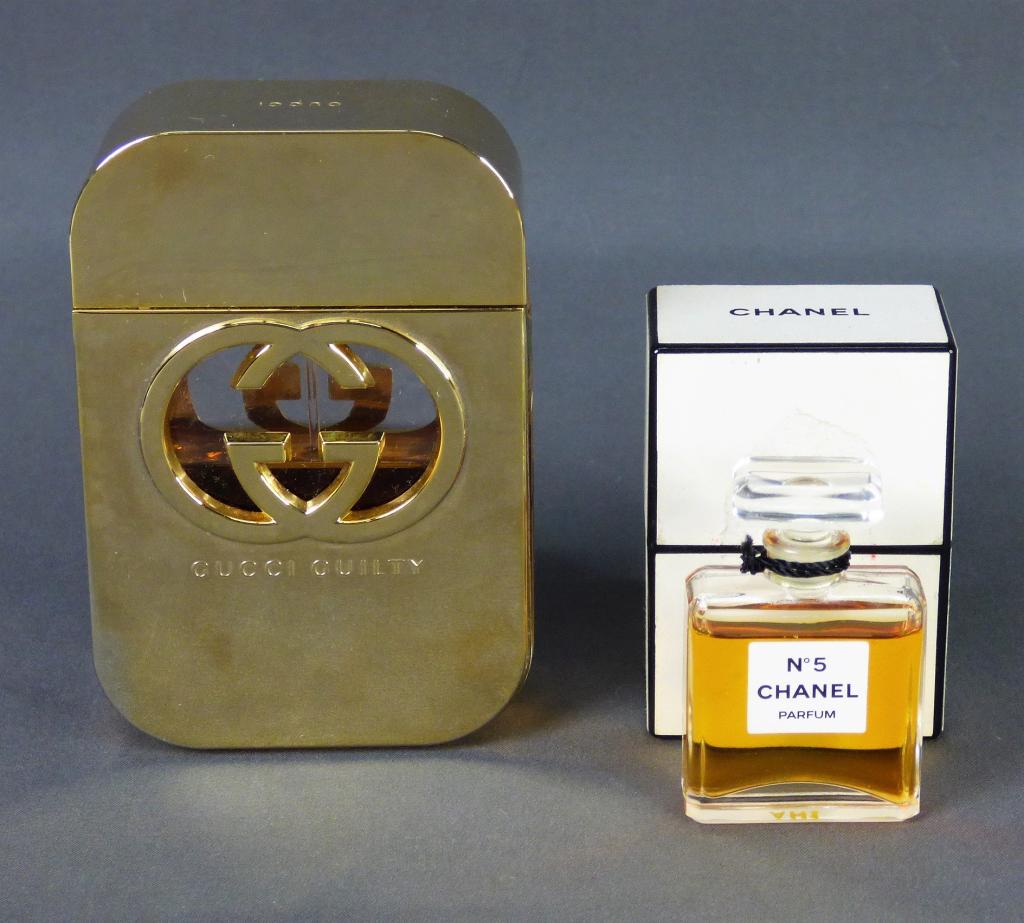 Gucci Guilty & Chanel No.5 Designer Perfumes: Chanel No. 5 1/4 fl oz Perfume in original box- near full and Gucci Guilty 2.5 fl oz Perfume- half full.