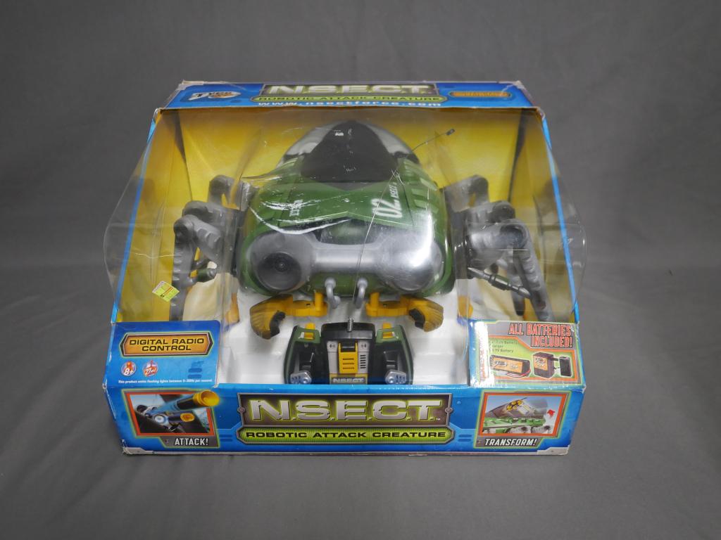 Tyco R/C N.S.E.C.T. Robotic Attack Creature: Tyco R/C N.S.E.C.T. Robotic Attack Creature. Mint/ near mint in original box.