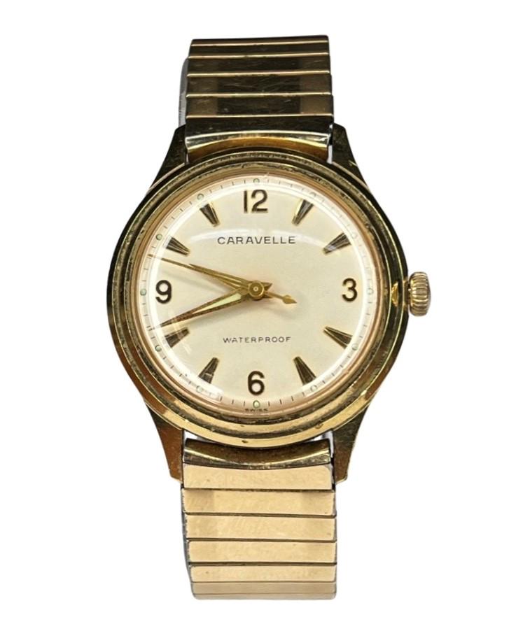 Vintage Caravelle by Bulova Waterproof Watch: Vintage Caravelle by Bulova Waterproof Swiss Made Wrist Watch. Good overall condition, starts to run but stops after few seconds.