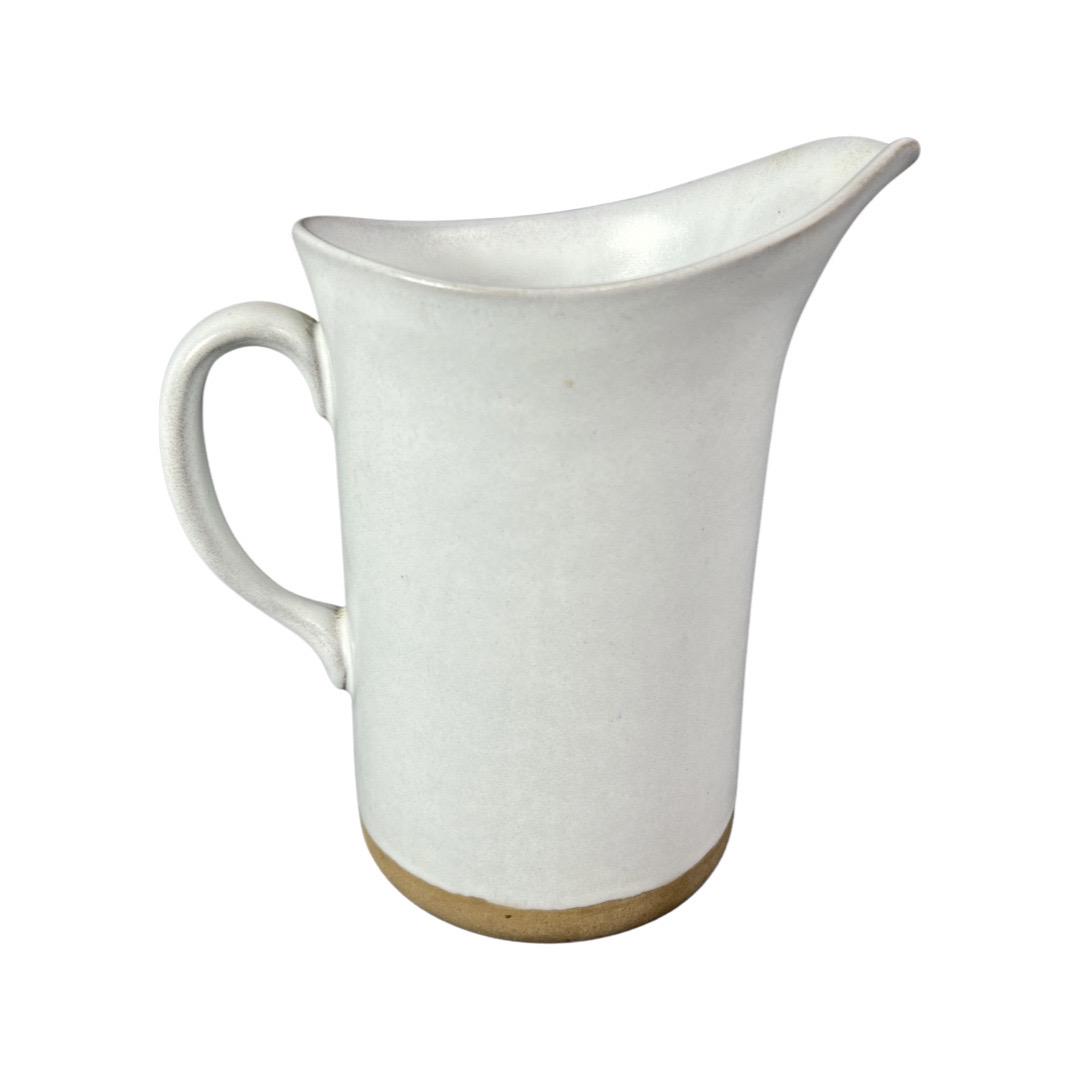 Mid Century Gordon Martz Art Pottery Pitcher/ Ewer: Vintage Matte White Glazed Gordon Martz Art pottery Pitcher. Signed and dated 1970 at the bottom. 7 1/2" tall. Good Condition.