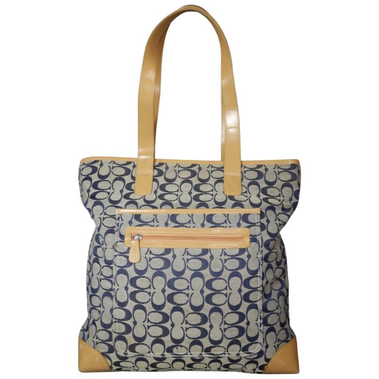 Coach Ladies Tote Bag/ Handbag/ Purse: Coach Ladies Tote Bag. 15" x 16". Good Ovrall Condition. Esquis Auction does not have specialists on designer purses and handbags and we can not guarantee authenticity of these items. Please, review a