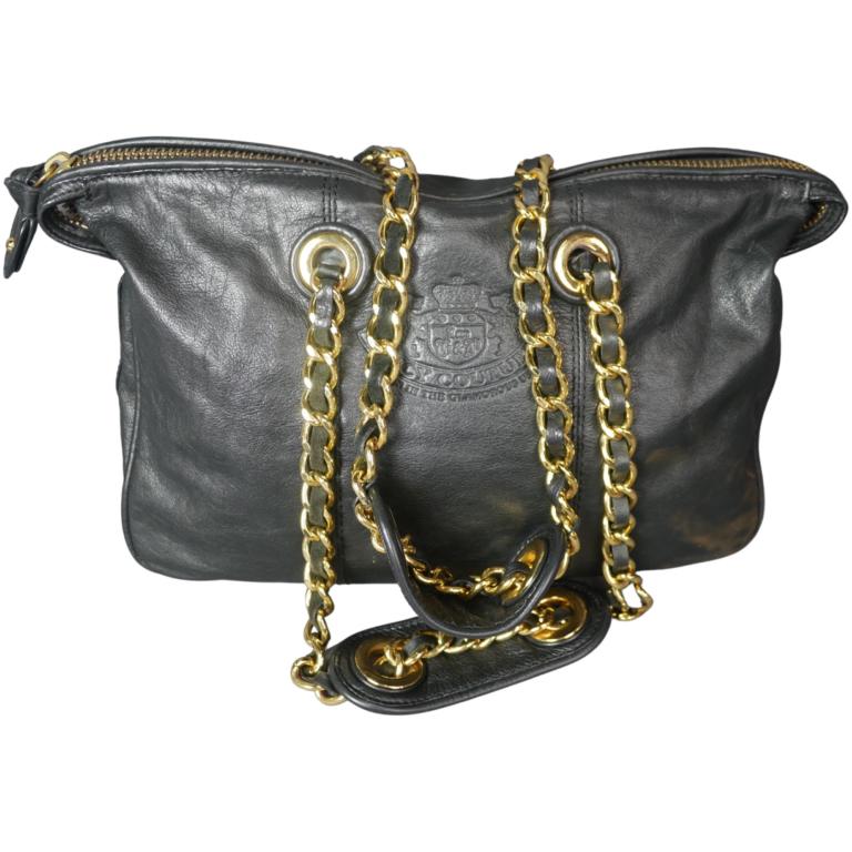 Juicy Couture Ladies Leather Handbag/ Bag/ Purse: Juicy Couture Ladies Leather Handbag/ Bag/ Purse. 15" x 10". Good Condition. Esquis Auction does not have specialists on designer purses and handbags and we can not guarantee authenticity of these ite