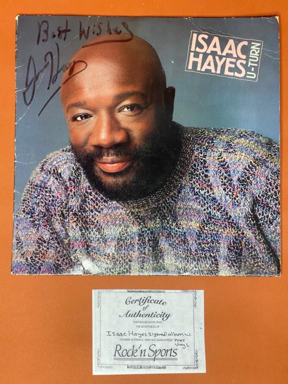 Isaac Hayes "U-Turn" Signed Vinyl Album Cover: Isaac Hayes Autographed "U-Turn" Vinyl Album Cover with Vinyl. Comes with Certificate of Authenticity. Condition: Good., some wear to cover. We truly believe that this item is authentic, but Esquis Au