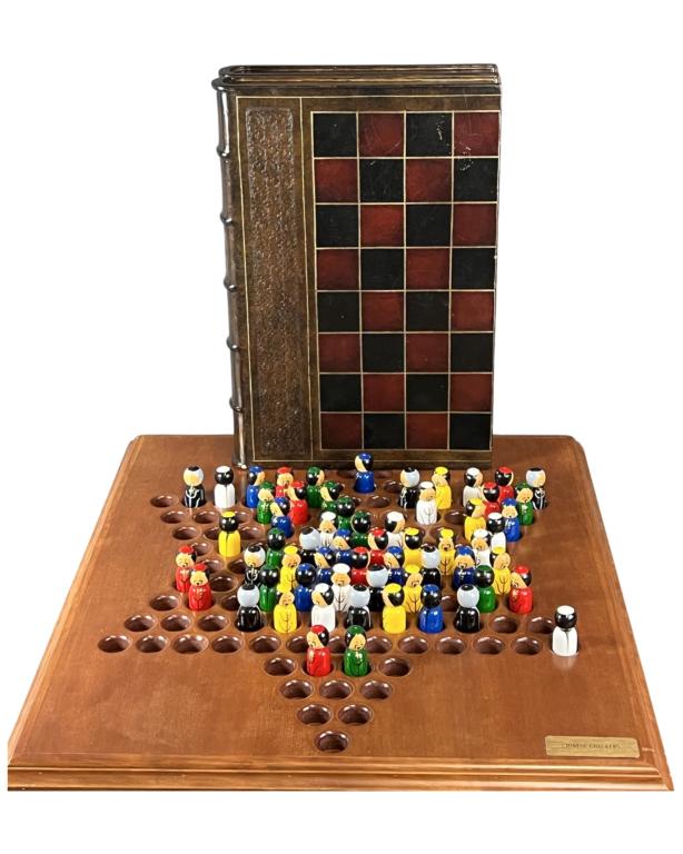 Carved Wood Chinese Checkers & Backgammon Game: Chinese Checkers with Carved and hand Painted Pieces in Chinese Folk Costumes.A leather-bound and gilt-tooled games box in the form of a folding book, the outside to be used for chess and the inside f