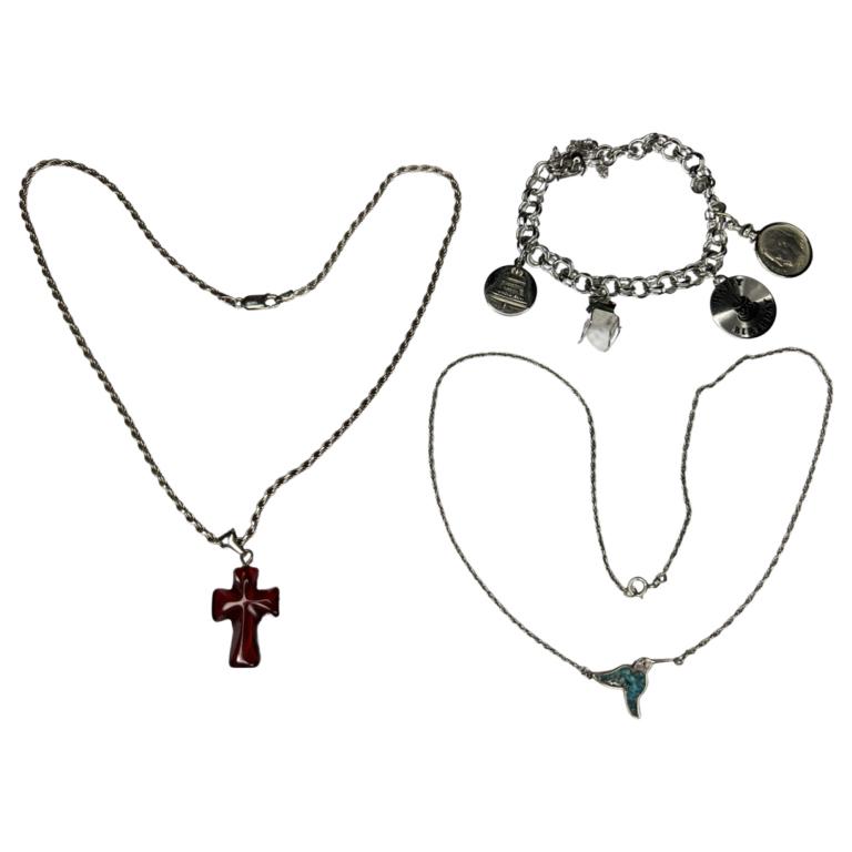 Sterling Silver Lucky Charms Bracelet & Necklaces: Sterling Silver Lucky Charms Bracelet with multiple charms and two Sterling Silver Necklaces. Bracelet is 6" long, neckalces are 17" long. All are in good condition.
