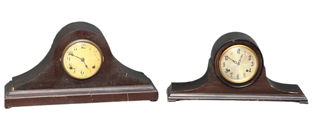 Two Antique Camel Back Mantel Clocks- New Haven: Two Antique Camel Back Mantel Clocks- one is "Harmonic" by New Haven". Measure 21" x 10 1/2" & 20" x 9 1/2". Good overall condition showing some age related wear, clockworks unknown.