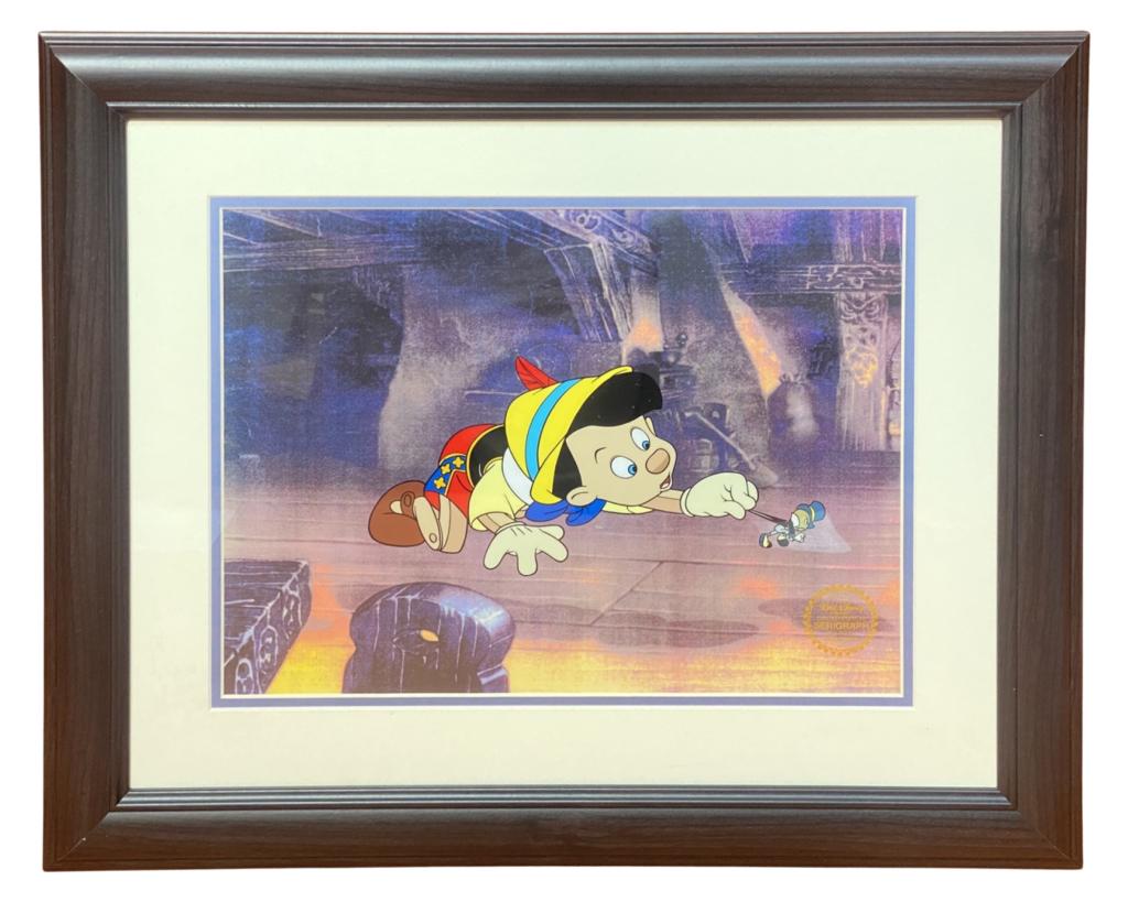 Pinocchio Disney Limited Edition Serigraph Cel: "Pinocchio" Disney Limited Edition Serigraph Cel. From edition of 9,500. Measures 21" x 17 1/2" framed. Comes with COA.