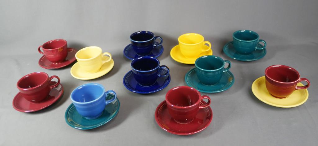 Group of Vintage Fiesta Cups / Mugs & Saucers: Group of Vintage Fiesta Cups & Saucers. Variety of colors. 11 matching colors; 3 unmatching colors- 14 sets total. All are in good condition.