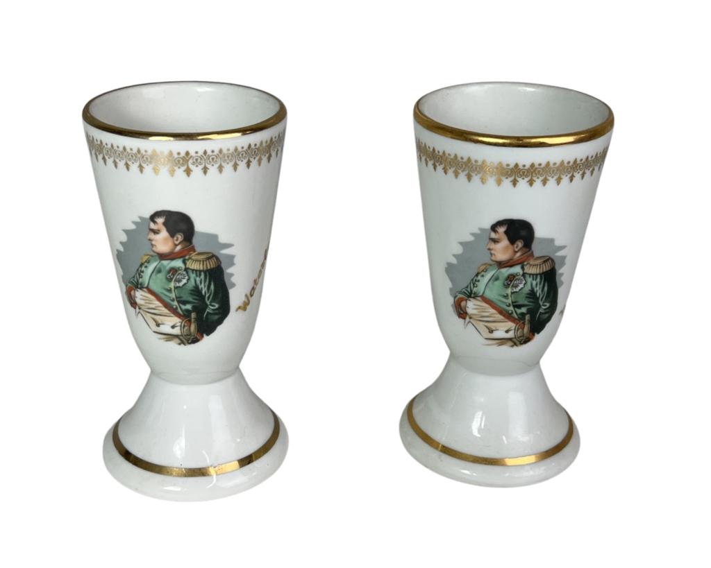 Porcelaine de Luxe Corse Napoleon Egg Cups: Vintage French "Porcelaine de Luxe Corse" Emperor Napoleon" Egg Cups. Measure 5 1/2" tall. Good Condition
