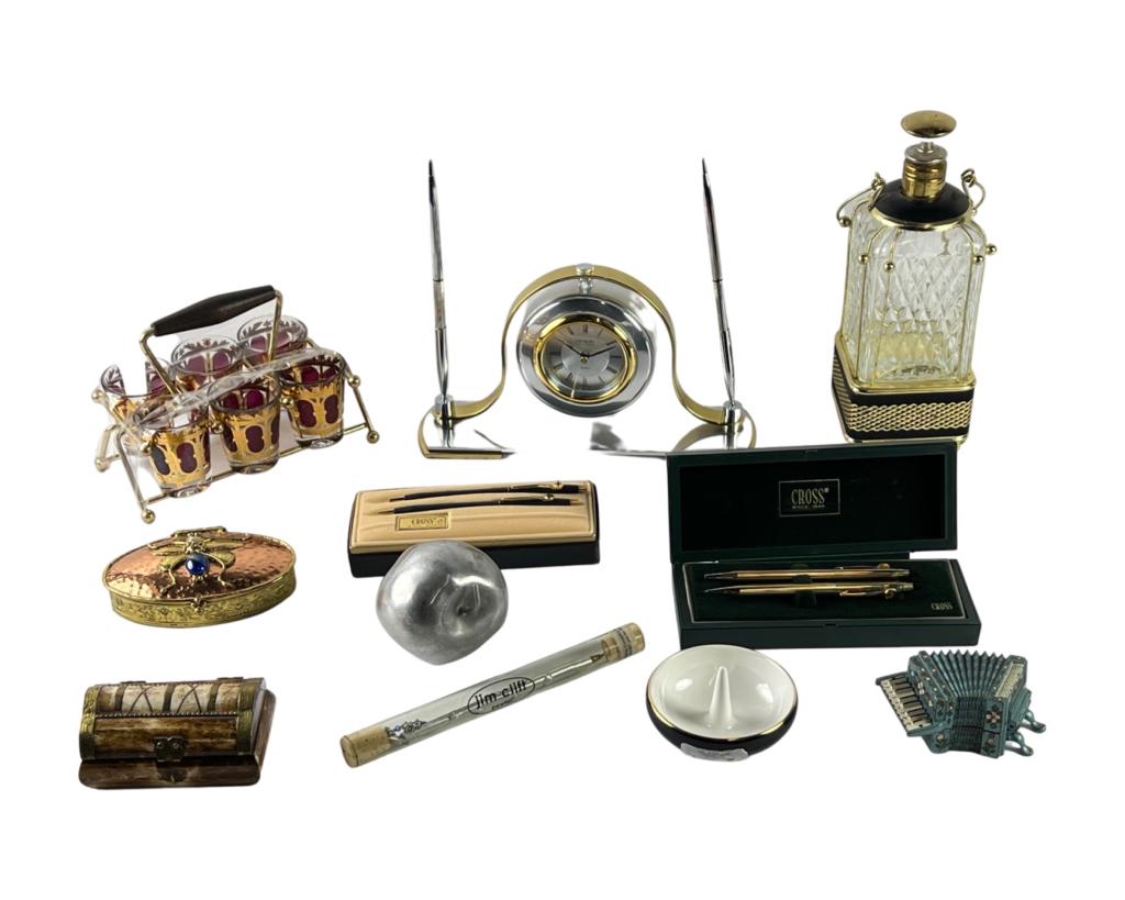 Desktop Collectibles-Crystal Clock, Pen, Trinket o: Desktop Collectibles including Crystal Clock; Music Decanter Set of Mid Century Ruby & Gold shotglasses, Trinket boxes including bone carved; Kate Spade Ring Holder; Cross Pen Sets, etc.. Tallest piec