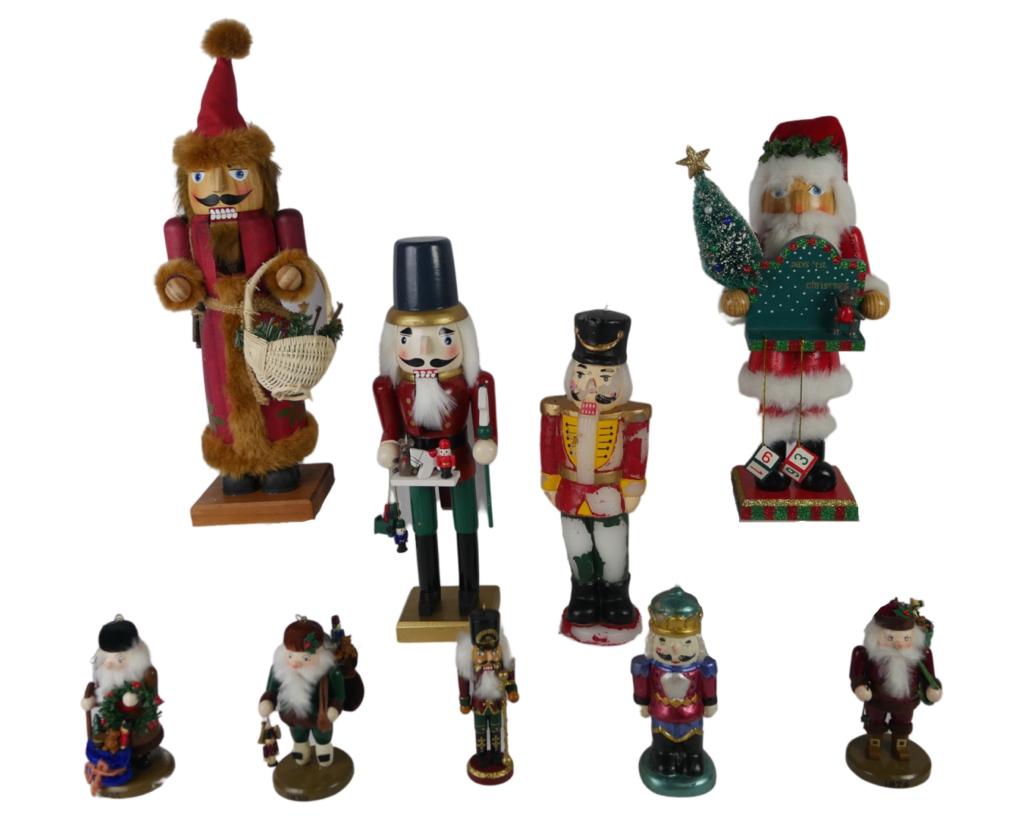 Christmas Holiday Wooden Nutcracker Figurines: Group of Vintage Christmas Nutcracker Figurines and two Candle Nutcrakers. 5 1/2- 17" tall. Good overall condition, few might be missing something.
