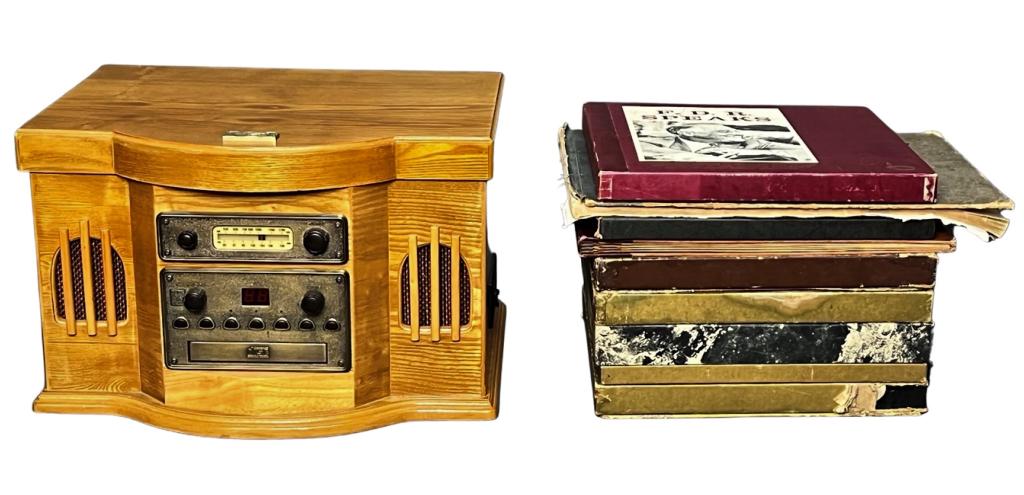 Spirit of St. Louis Phonograph Record Player CD Pl: Spirit of St. Louis Phonograph Record Player/ CD/ Tape Player with stack of old Vinyls. Good overall condition, turns on, not fully tested.