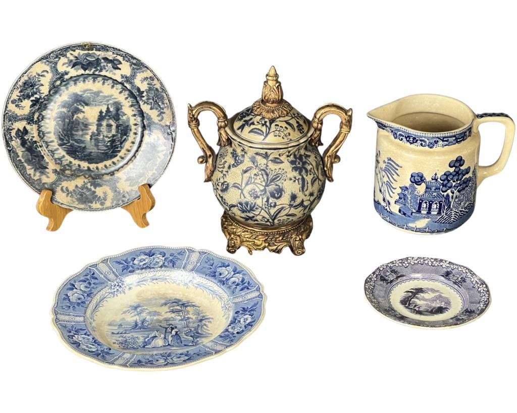 Antique English Blue Flow China Assortment: Group of Antique mostly English Blue Flow China. Olympian Blue Flow Dinner Plate; Imported Stone CHina Plate; Blue Flow Urn with Gold Gilted Handles & Base; Semi-Vitreous Buffalo Pottery 1910 Pitcher.