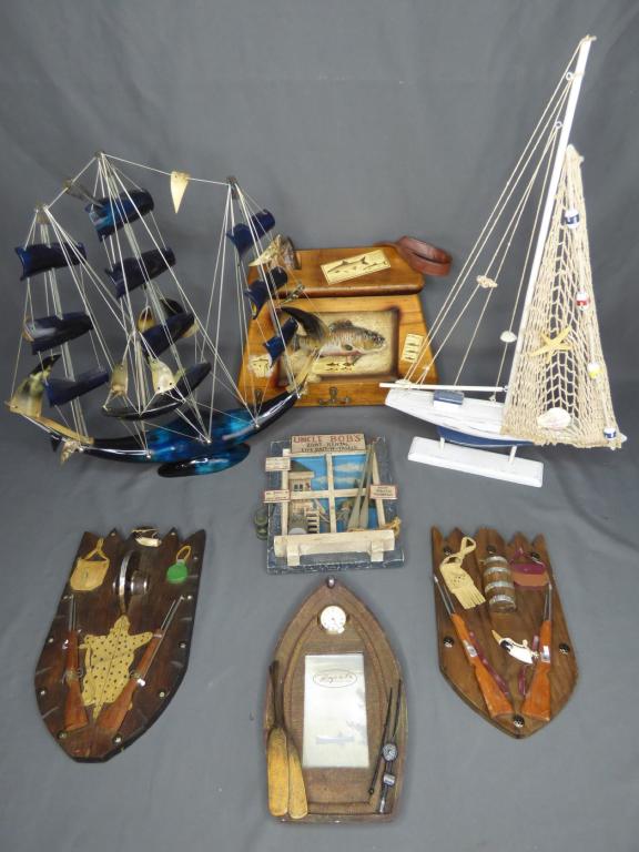 Horn Carved Sailing Ship, Hunting & Fishing Decor: Large Horn Carved Sailing Ship Model, Wooden Yacht Model. Group of Hunter's and Fisherman's Decor Plaques. Horn ship is 18 1/2" x 18". All are in good condition.