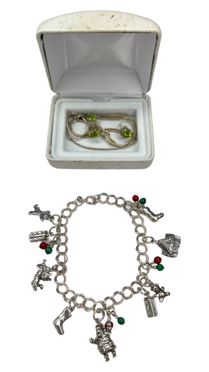 Sterling Silver Holiday Christmas Charm Bracelet: Sterling Silver Holiday Christmas Charm Bracelet and Sterling Necklace with matching Earrings. Necklace is 24" long; bracelet is approx. 3" in dia. All are in good condition.