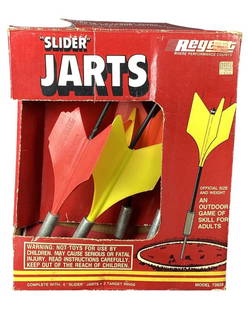 "Slider Jarts" Lawn Darts Game by Regent: "Slider Jarts" Lawn Darts Game by Regent in original box. 1 Red Jart has broken fin and missing cap nut (replaced with regular nut), 1 yellow jart has dried paint drips on fins, missing both target ri