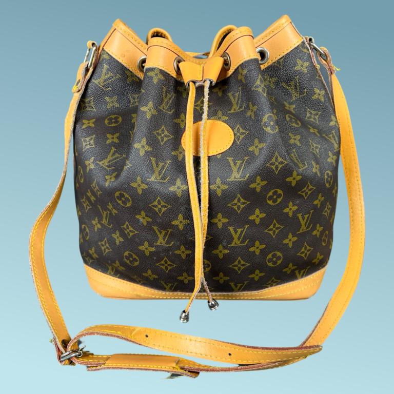 Louis Vuitton Noe Shoulder Bucket Bag: Louis Vuitton Noe Shoulder Bucket Bag. 12" x 12" x 8". Good overall condition. Esquis Auction does not have specialists on designer purses and handbags and we can not guarantee authenticity of these i