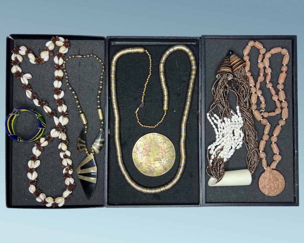 Exotic African, Asian & South American Jewelry: Exotic African, Asian & South American Jewelry including pieces made from Horn, Seashells, Beads, Pottery, Copper & Brass. All are in good condition.