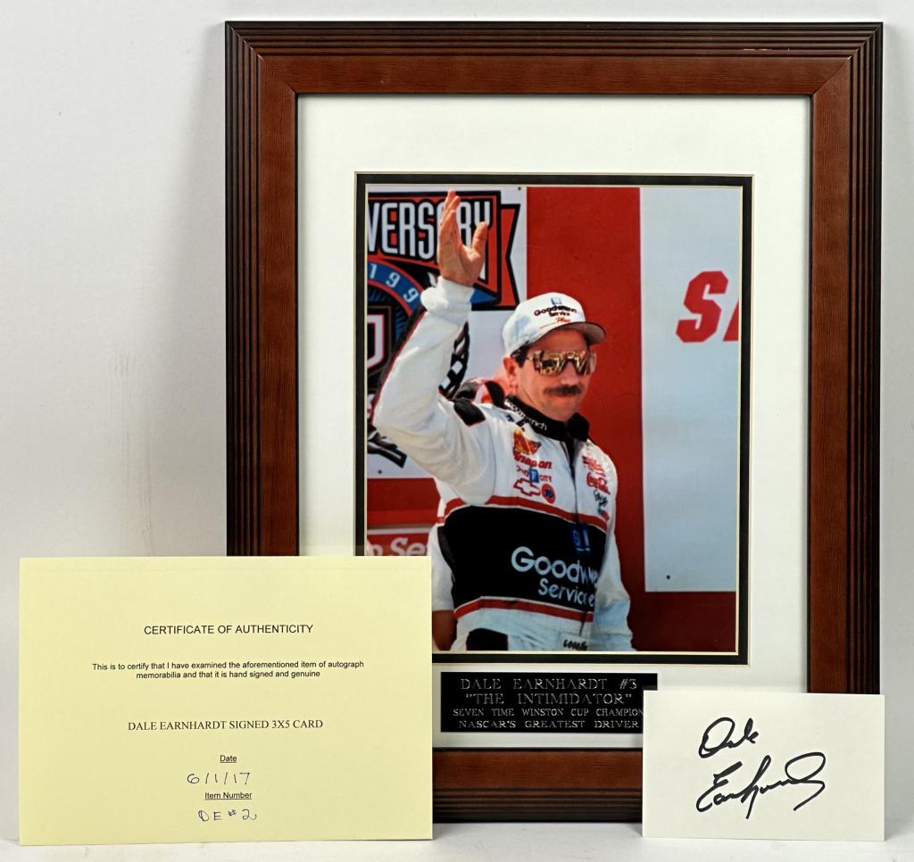 Dale Earnhardt Framed Autograph with Photo: Dale Earnhardt Autographed/Signed 3"x 5" Card with Framed Photograph. 16.5x13.5 frame. Comes with Certificate of Authenticity. Condition: Good. PLEASE READ BEFORE BIDDING: Esquis Auctions does not hav