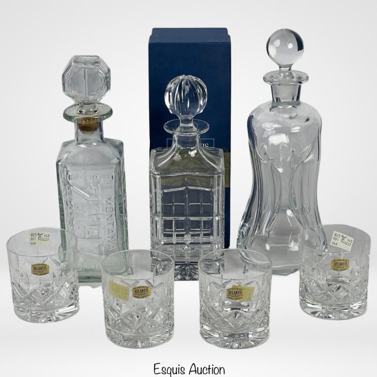 Art Glass & Crystal Liquor Decanters- Waterford, k: Vintage Large Holmegaard Kluk Kluk Clear Decanter, Marquis by Waterford Decanter and Vintage Glass Walker Deluxe Montana License Plate Bottle/ Decanter. Come with four Atlansis Crystal Glasses. Decant