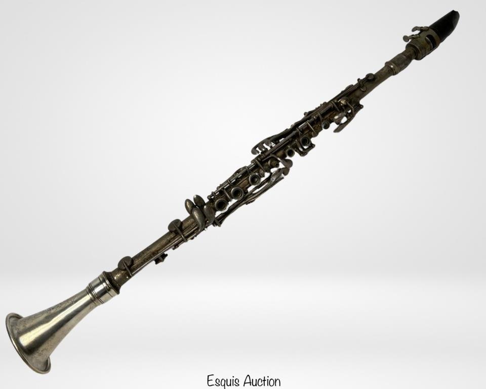 Antique Metal Clarinet- Beaufort Chicago Illinois: Antique Metal Unidentified Metal Clarinet. Front piece is marked Beaufort Chicago Illinois, Mouthpeace ring isby Buffet Crampton.Serial number foundunder one ofthe keys is 3065. As found condition, re