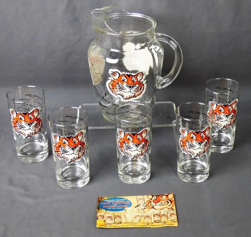 Vintage Anchor Hocking Tiger Pitcher & Thumblers: Vintage Anchor Hocking Tiger Pitcher & Thumblers. Each Thumbler says "Put a Tiger in your Tank" in 8 different languages. 9"-5 1/2" tall. Good Condition.