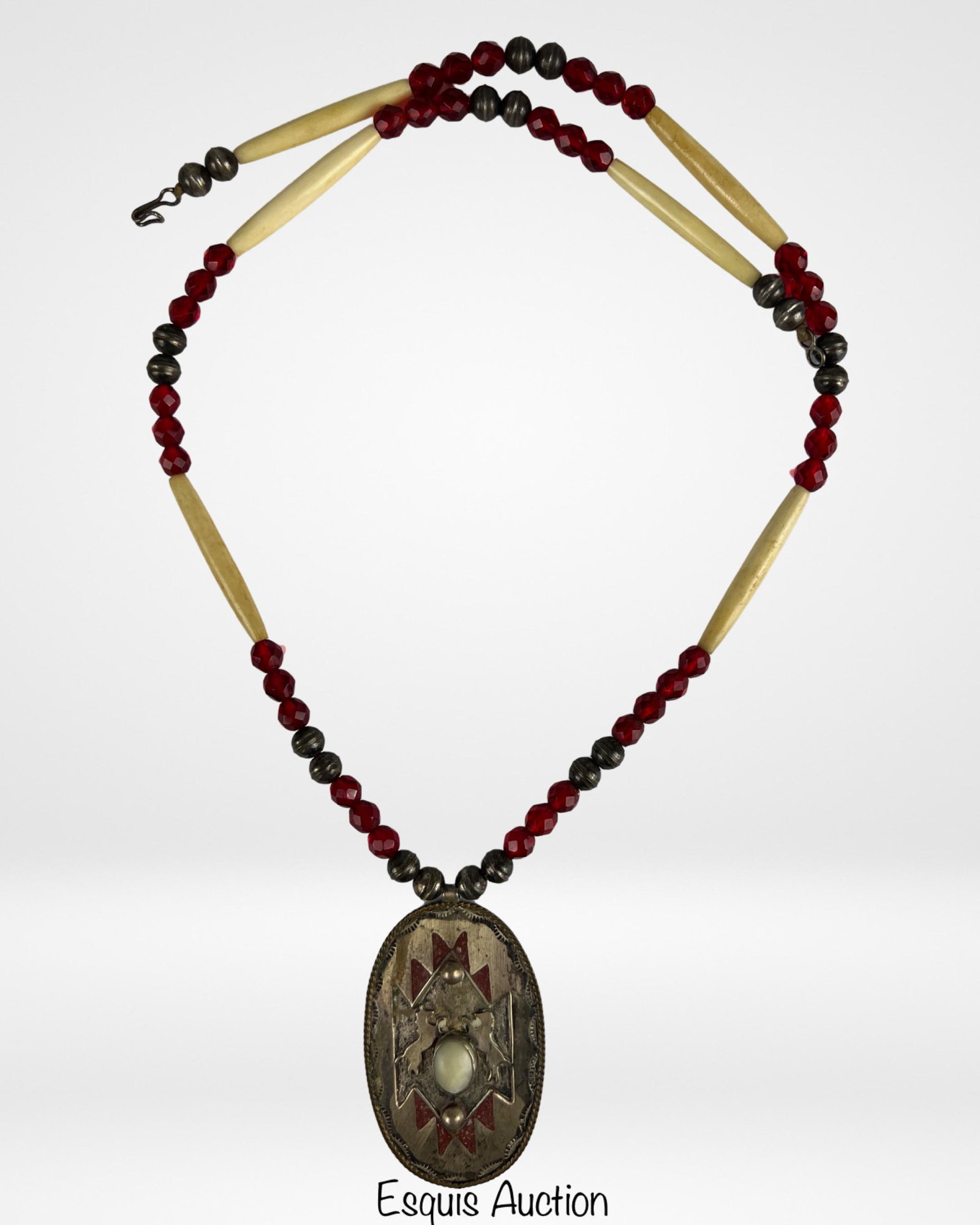 Native American Sterling Silver Necklace w/ Shield: Vintage Native American Necklace made of Hand Rolled Sterling Beads, Garnet Beads and Bone Tubes. Pendant is Shiled Shaped with Two Rearing Horses over the Pearl. Neckalce is 28", pendant is 3" x 1 3/