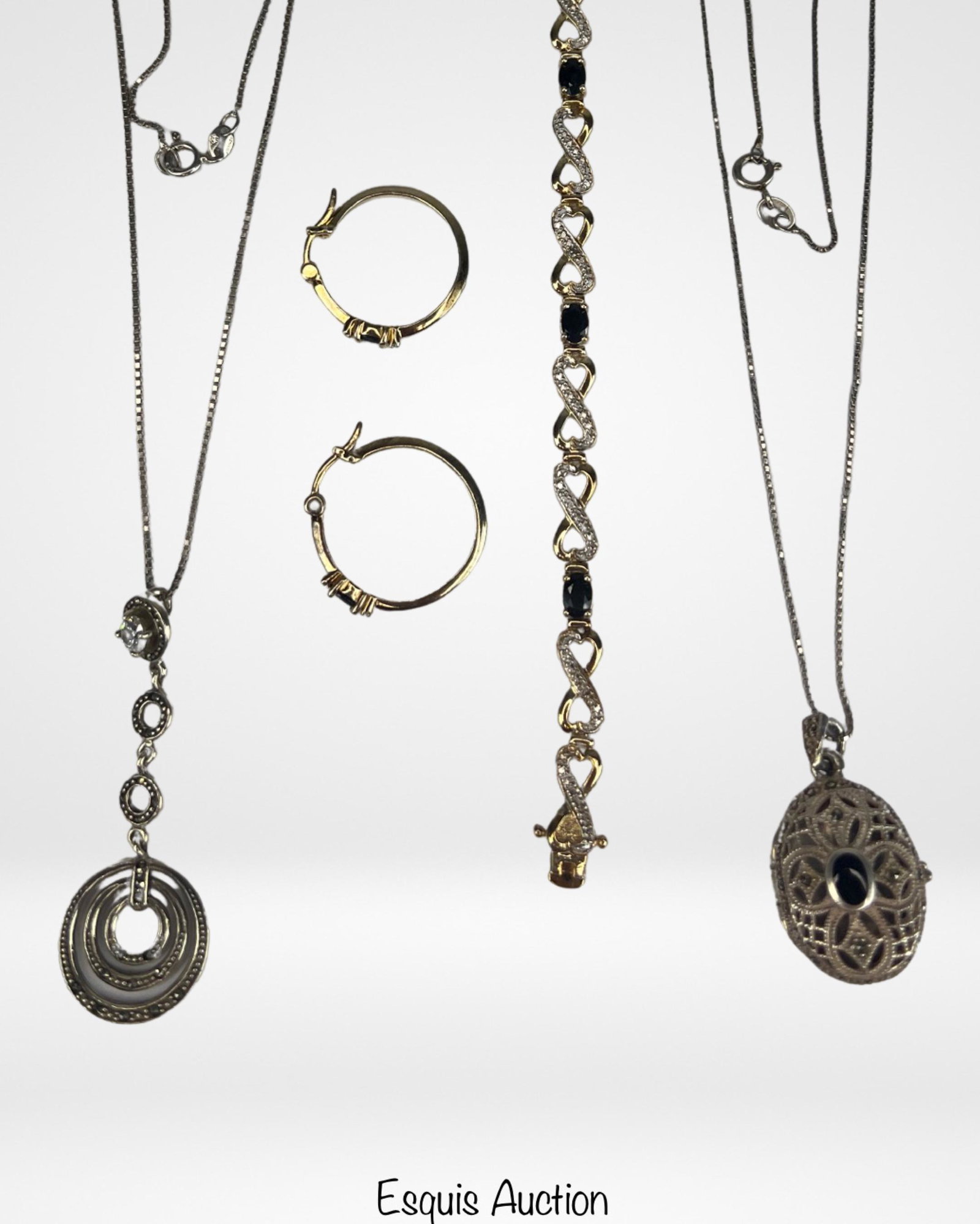 Sterling Silver Jewelry- Neckalces, Bracelet, Ears: Sterling jewelry- bracelet with blue stones and matching earrings, two necklaces- 22" long. One is with marcasite locker pendant. Good Condition.