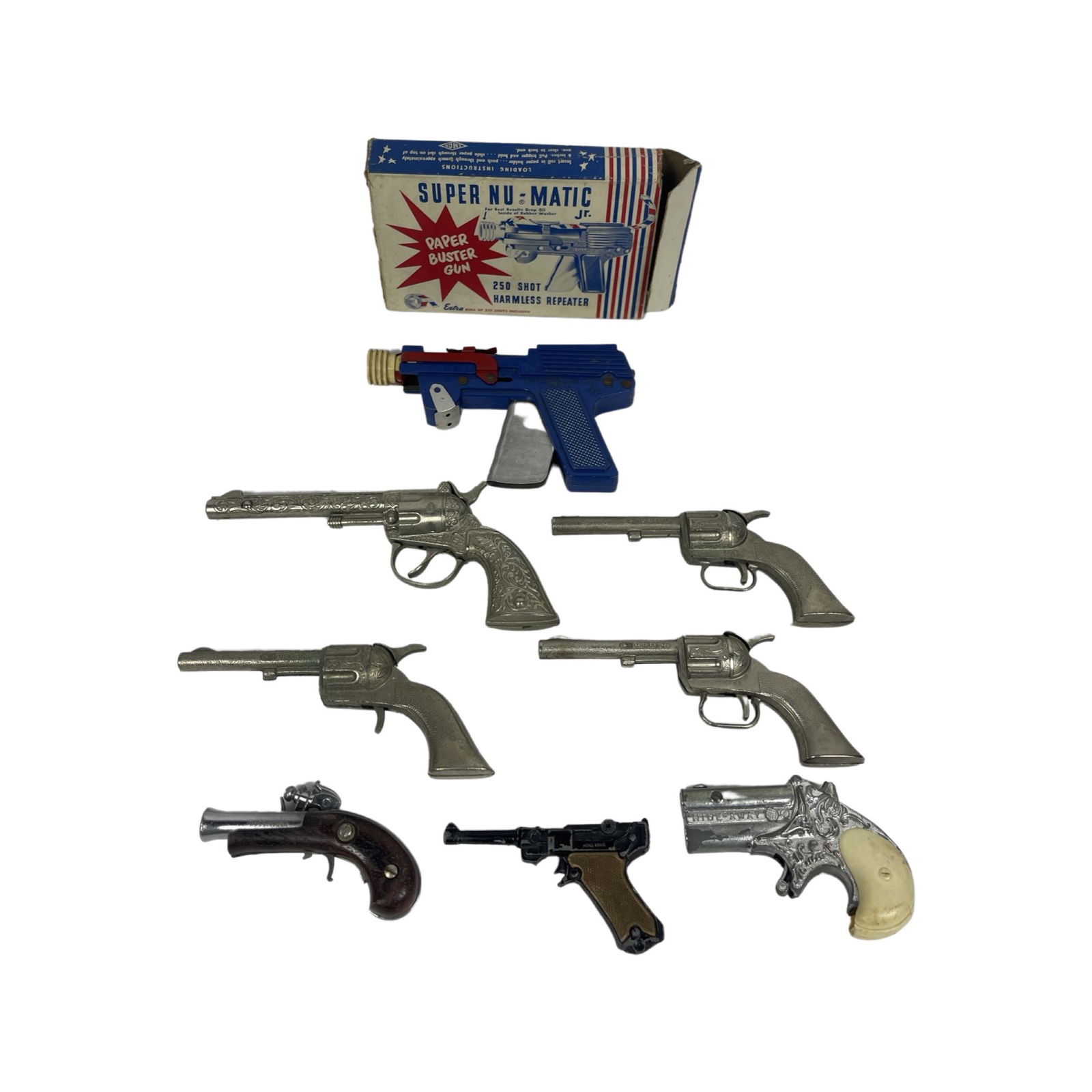 Vintage1950' s Cap Guns Pistols Lot Of 8 Pistols: Vintage1950' s Cap Guns Pistols Lot Of 8 Including Hubley,Super Nu-Matic Jr,Buccaner NicholsUntested!!!Good Condition Overall !!!!