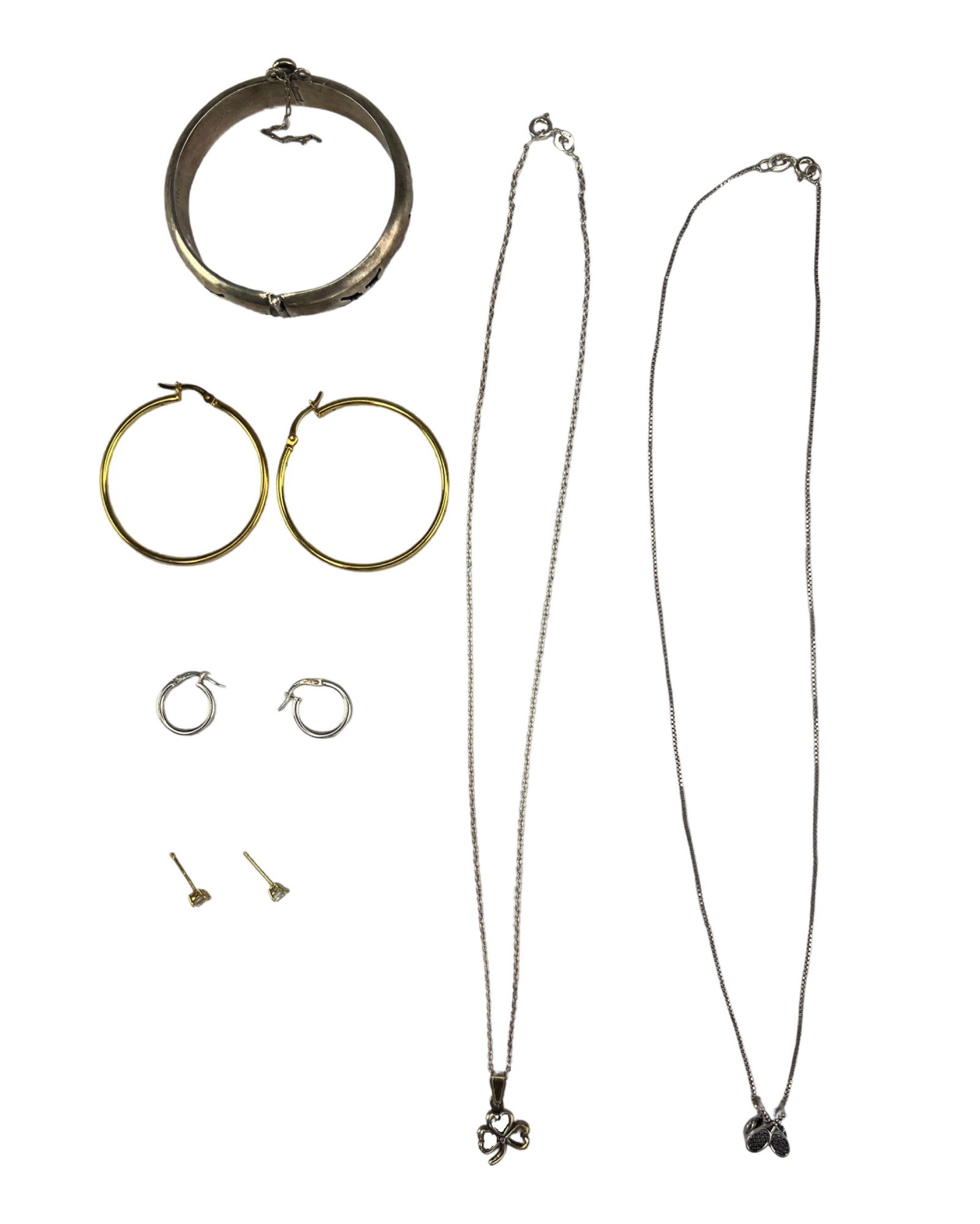 Sterling Silver Jewelry- Necklaces, Earrings, Brac: Sterling Silver Jewelry including two Neckalces with Pendants, Two pairs of Hoop Earrings, Stud Earrings with simulant diamonds and Clasp Bracelet. Necklaces are approx. 18" long, Earrings are 1 1/2"-