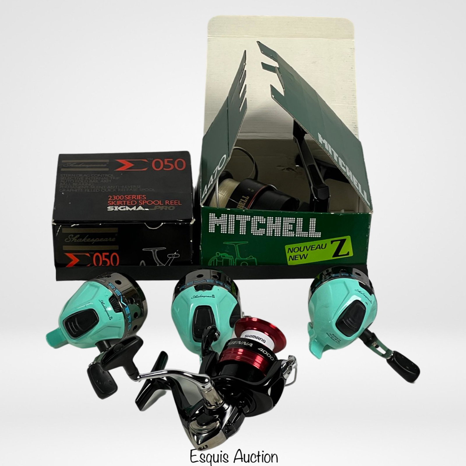 Lot of Mint Fishing Reels- Mitchell, Shakespeare,S: Group of Fishing Reels- Shakespeare Sigma Pro 050 in Original Box, Mitchell 4470 in Original Box, Shimano Sienna and 3 Shakespeare Reverb. All are in mint/ near mint condition.