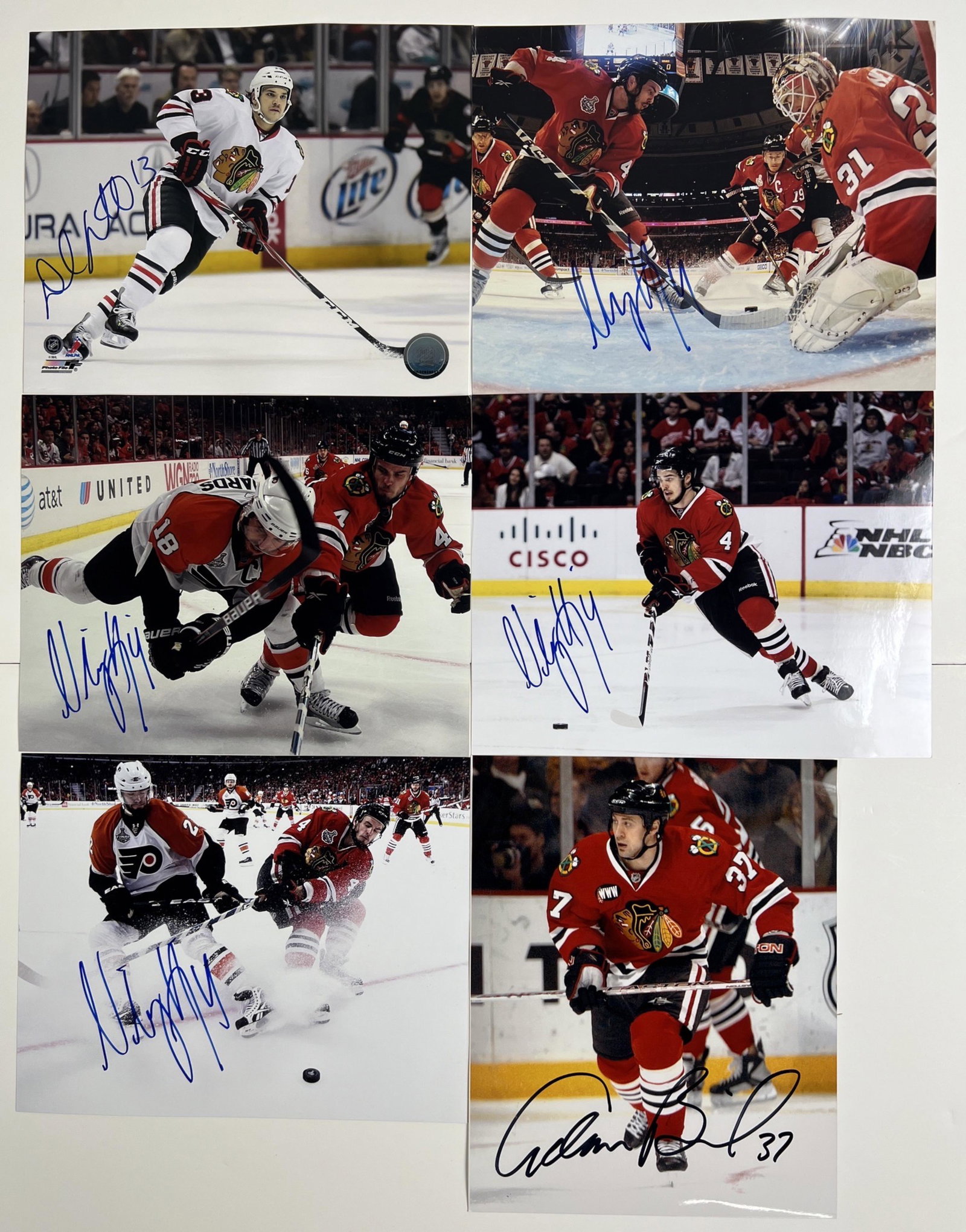 Chicago Blackhawks Signed Photo Collection: Chicago Blackhawks 8" x 10" Signed Photo Collection including Daniel Carcillo, 4 Photos of Niklas Hjalmarsson, Adam Burish. PLEASE READ BEFORE BIDDING: Esquis Auctions does not have specialists on sig
