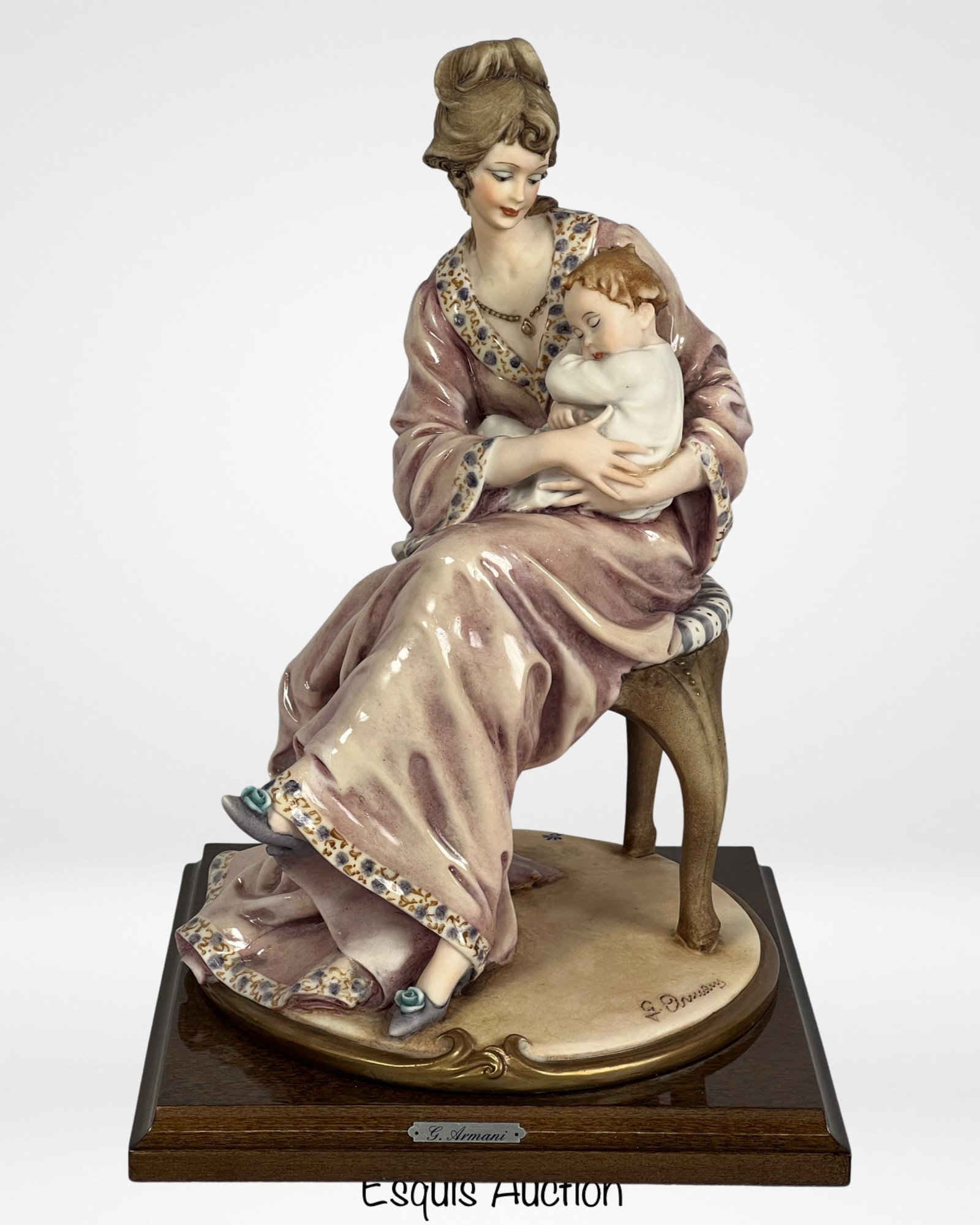 Giuseppe Armani- "Mother and Child" Figurine: Celebrate the timeless bond between a mother and child with this exquisite Giuseppe Armani "Mother with Child" handcrafted figurine. The beautifully sculpted piece depicts the tender moment between a 