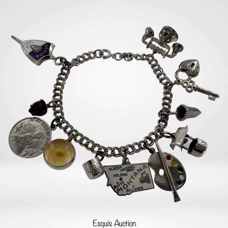 Sterling Silver Charm Bracelet: Sterling Silver Charm Bracelet with Multiple mostly Sterling Vintage Charms. 7" long. Good Condition.