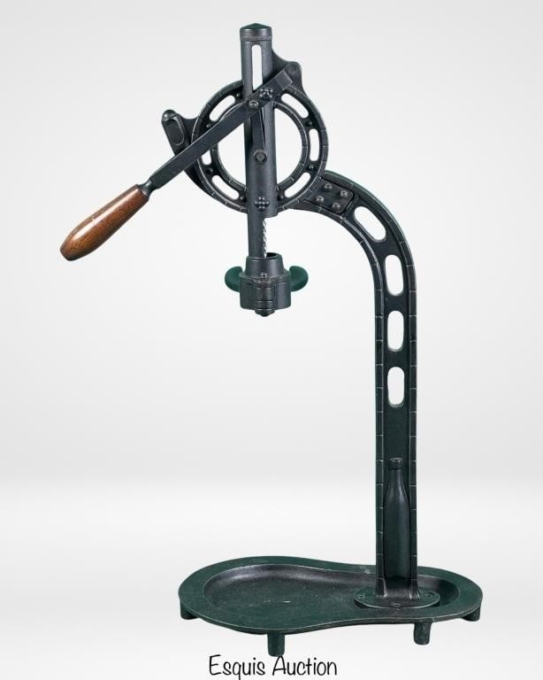 Cast Iron Wine Corking Machine/ Wine Bottle Opener: Introducing a vintage Cast Iron Wine Corking Machine and Bottle Opener, a unique piece that speaks to the craftsmanship of yesteryears. This substantial tool measures 27" x 16" and is in good conditio