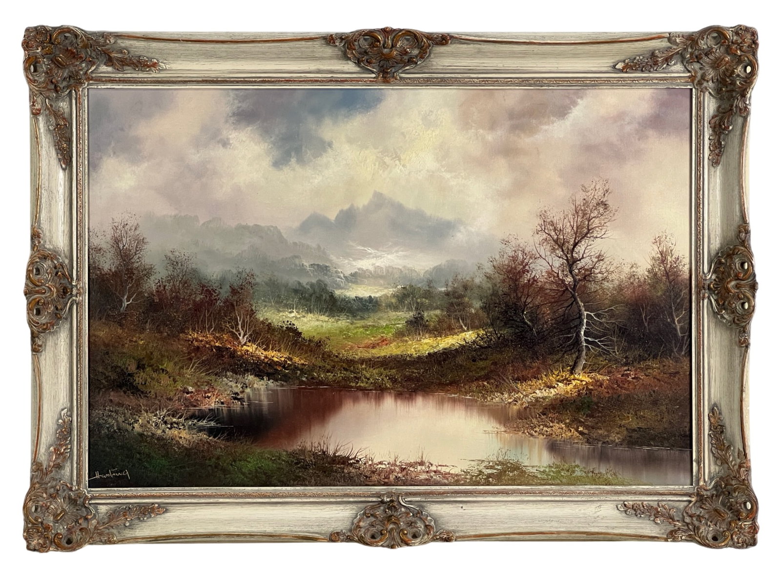 Realistic Landscape Oil Painting by Harting: Immerse yourself in the beauty of a realistic landscape captured on canvas, featuring stormy mountains as the backdrop. The painting, skillfully executed by an artist with the signature "Harting" in t