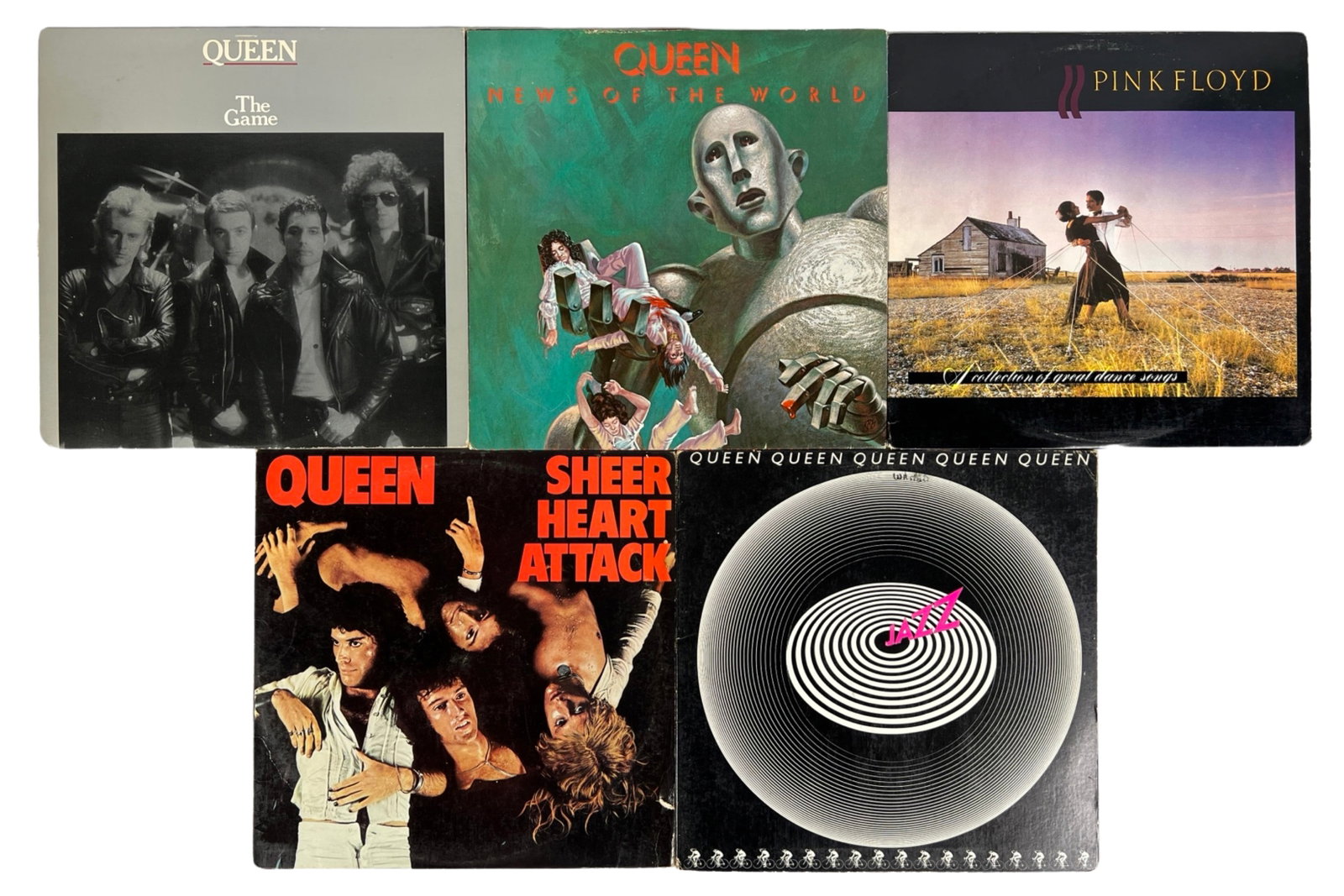 Queen & Pink Floyd Iconic Vinyl Records: Explore the musical genius of two legendary bands with this collection of iconic vinyl records by Queen and Pink Floyd. From Queen's anthems to Pink Floyd's sonic journeys, these albums are timeless c