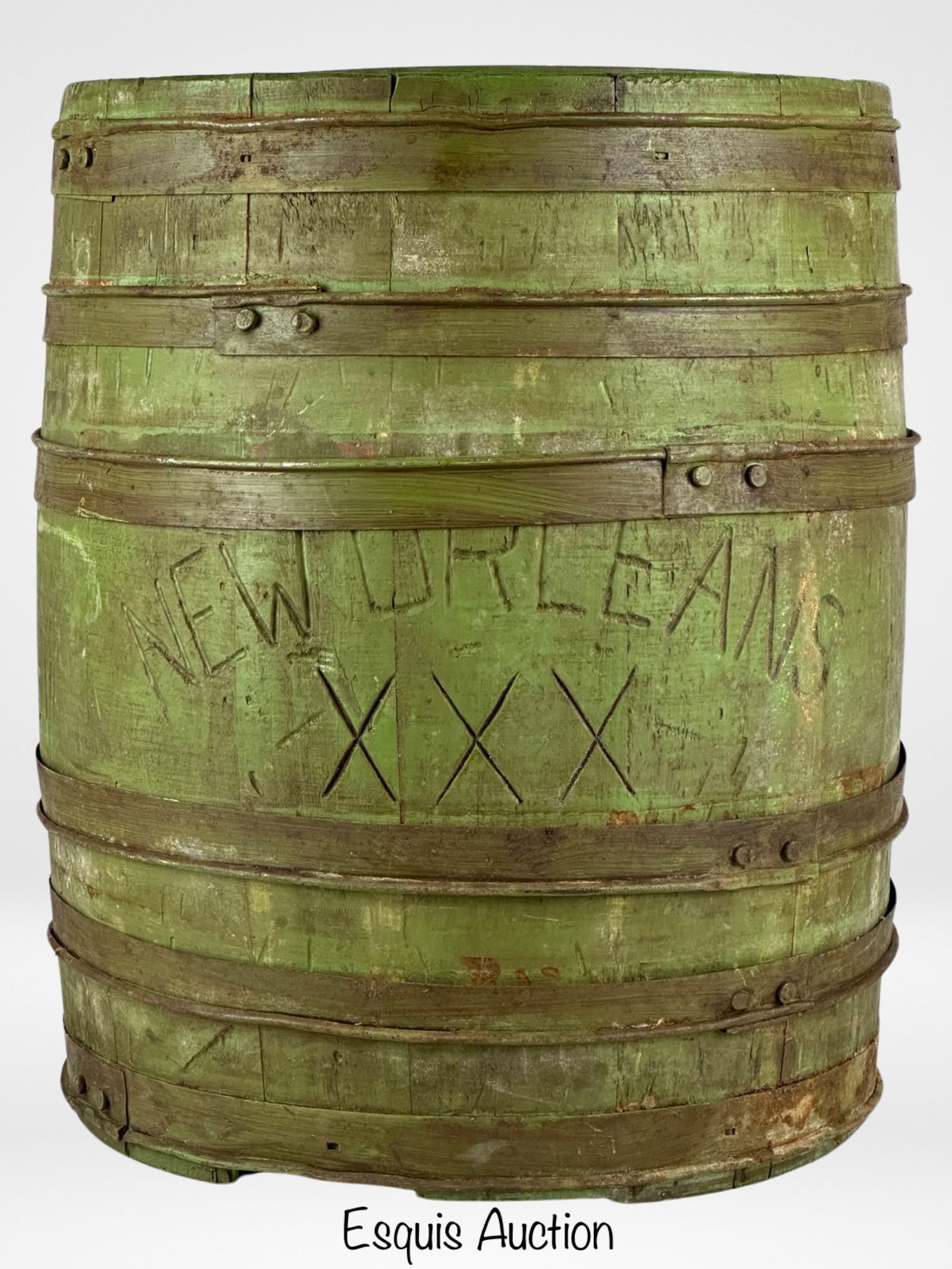 Antique "New Orleans 1896" Wooden Barrel: This antique wooden barrel is a remarkable piece of history. With its distinctive green color, it bears the inscription "New Orleans XXX" on one side and is dated "1896" on another, marking a moment i
