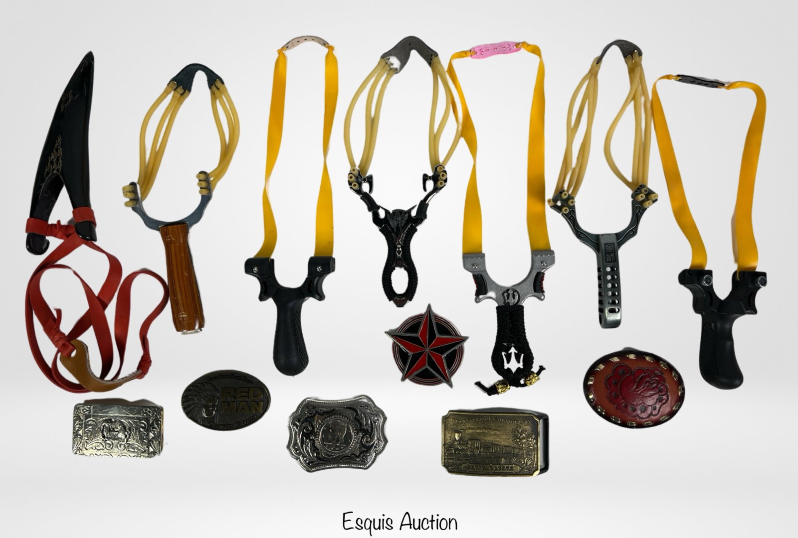 Collection of Slingshots & Metal Belt Buckles: Collection of Slingshots & Metal Belt Buckles
