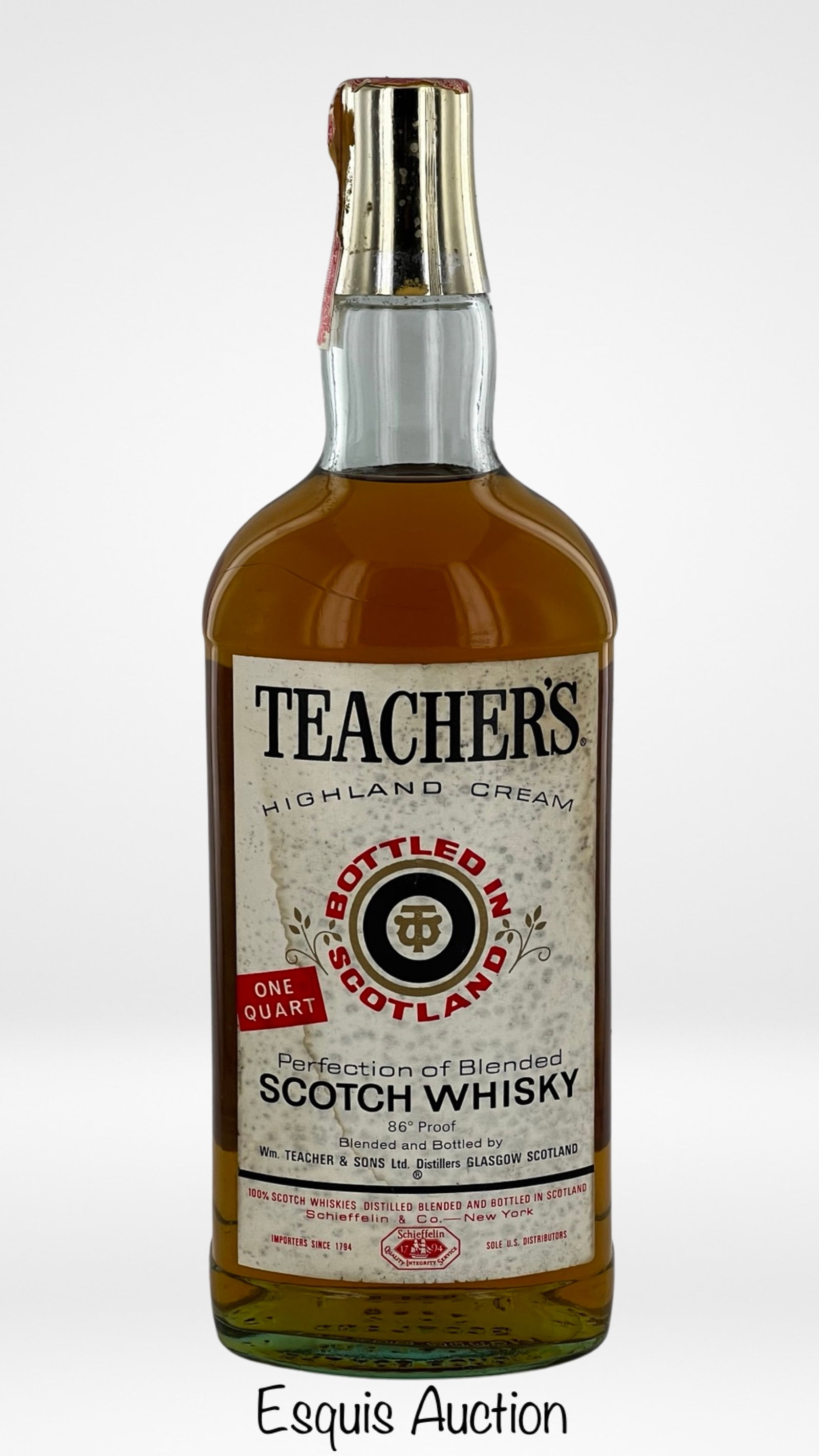 Teacher's Highland Cream Scotch Whisky from 1960's: The Teacher's Highland Cream Scotch Whisky, in a One Quart bottle from the late 1960s to early 1970s, is a true relic of Scotch whisky heritage. This sealed bottle encapsulates the rich history and tr