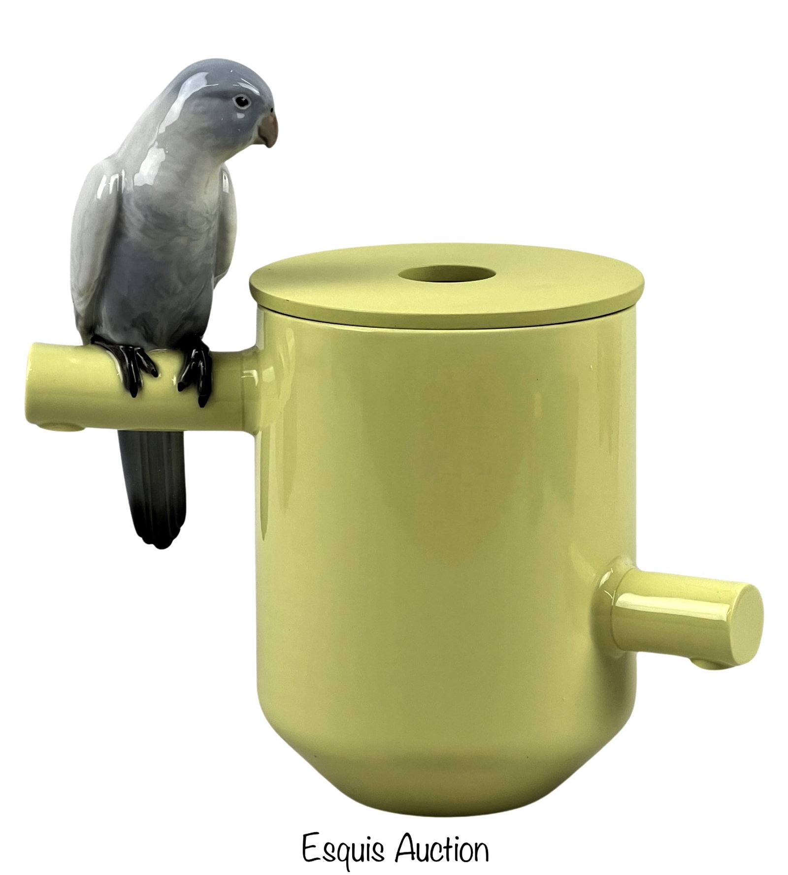 Lladro Parrot's Scented Treasure Candle Holder: This Lladro Parrot's Scented Treasure Candle Holder is a truly captivating piece of artistry and functionality. Measuring 10 1/2 inches by 10 inches, it combines the elegance of a candle holder with t