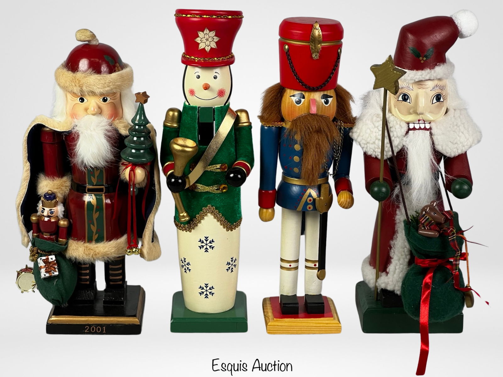 Lot of Wooden Christmas Nutcrackers: Lot of Wooden Christmas Nutcrackers. 15"-14" tall. Good condition.